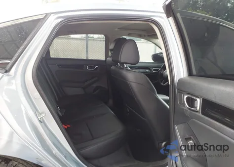 2022 Honda Civic Touring z USA, uszkodzony, nr VIN 2HGFE1F9XNH321703